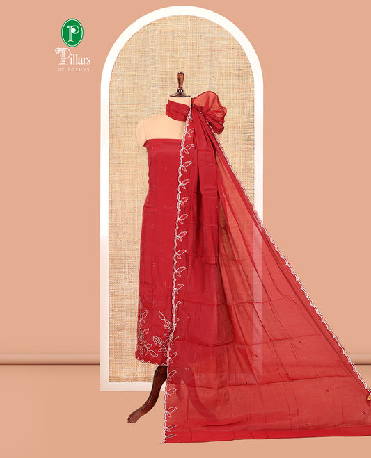 Maroon Mul Chanderi Material Churidar Features a Floral Outline Embroidered Top, a Santoon Bottom, a Scallop Threadwork Dupatta