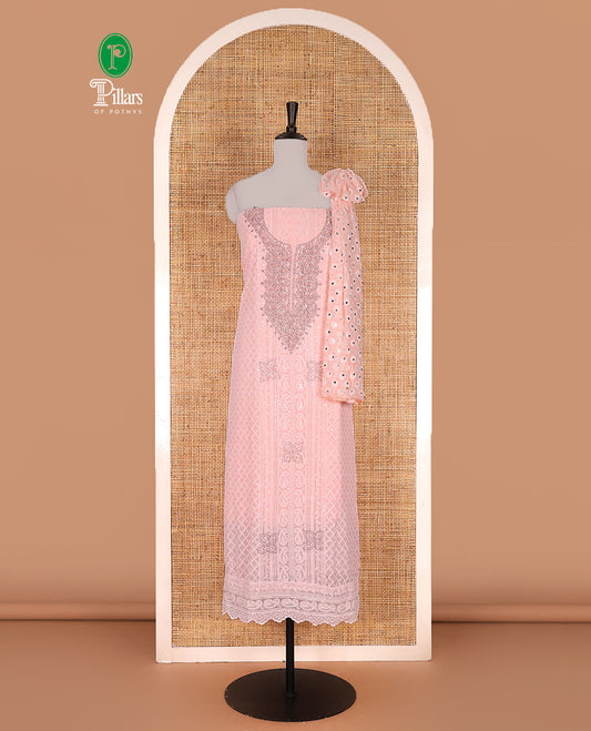 Peach material churidar set, stone work with Schiffli style embroidered georgette top, American Crape bottom, and polka dotted printed mirror work dupatta