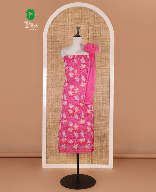 Pink churidar material set, floral print with thread outlined organza top, plain santoon bottom, and floral vine sequins embroidered organza dupatta