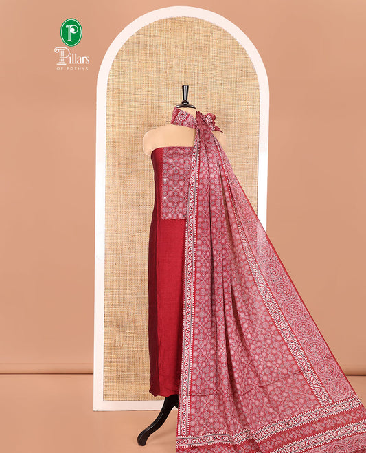 Red Material Chudidhar Set, Bedecked with Ajrakh Patch Work and Mirror Work, Vichitra Silk Top, Plain Santoon Bottom, and Chinon Silk Dupatta Featuring Intricate Ajrakh Prints