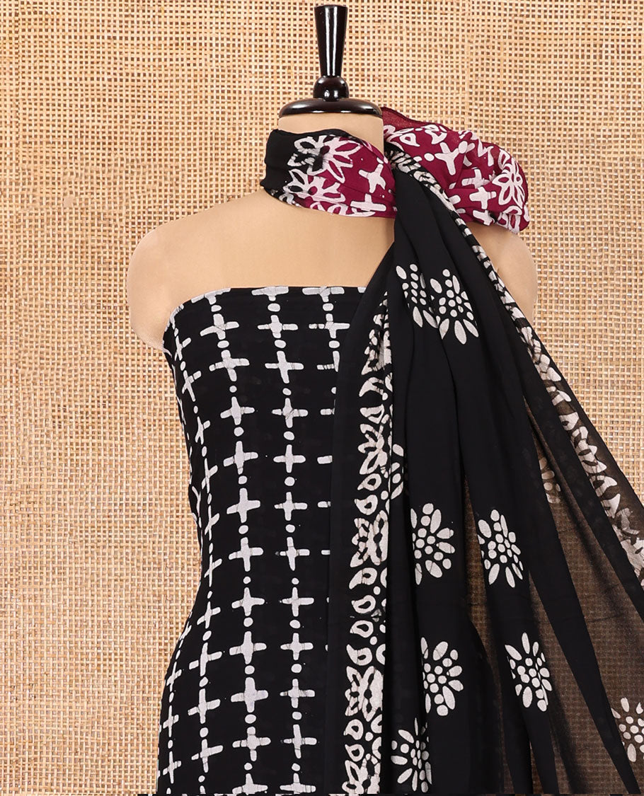 Black and Purple Material Chudidhar Set, Adorned with Batik-Style Printed Viscose Georgette Top, Rayon Batik Printed Bottom, and Viscose Georgette Dupatta of Batik Print