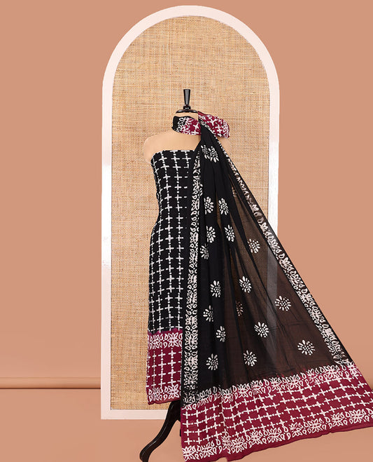 Black and Purple Material Chudidhar Set, Adorned with Batik-Style Printed Viscose Georgette Top, Rayon Batik Printed Bottom, and Viscose Georgette Dupatta of Batik Print