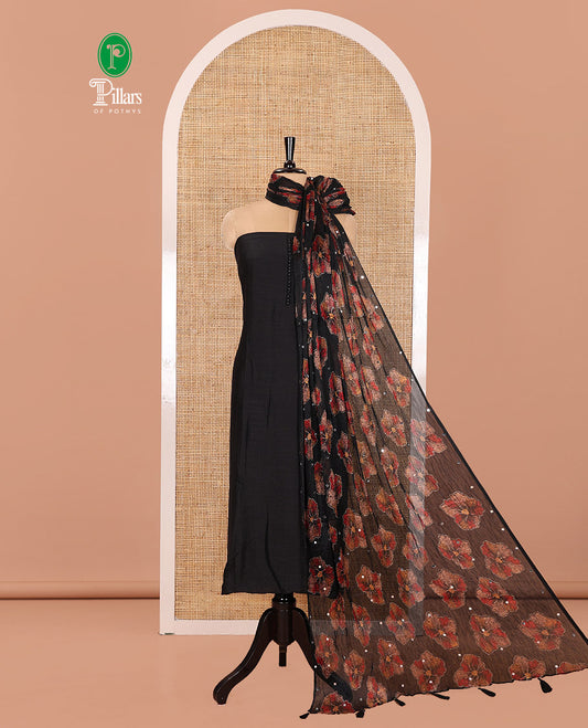 Black Material Churidar Set, Adorned with Plain Vichitra Silk Top, Comes with a Plain Santoon Bottom, and Is Paired with a Crushed Chiffon Dupatta of Floral Print and Mirror Work