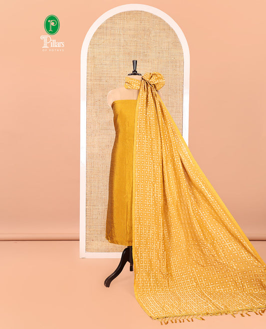 Mustard Vichitra Silk Material Churidar Set, Subtly Made Plain Top, a Plain Santoon Bottom, and Paired with a Vichitra Silk Bandhani Dot Enclosed Checked Dupatta