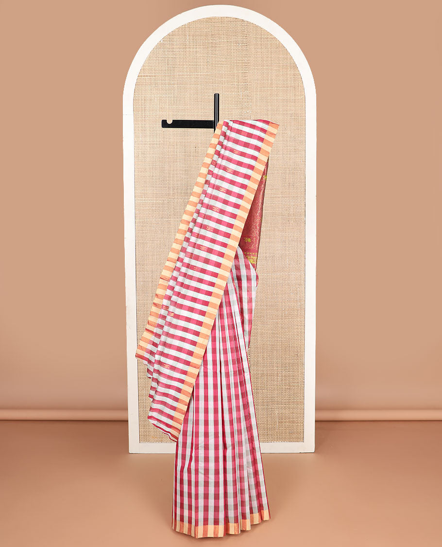 Red checked silk cotton saree with contrast striped border & floral design pallu
