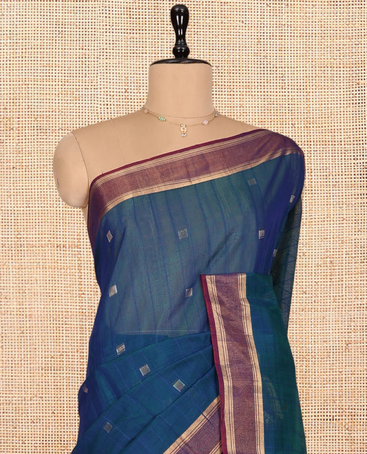 Blue Silk Cotton Saree, Decked Up with Zari Buttas, Complemented by a Contrast Zari Border, Intricate Pallu, and a Contrast Blouse