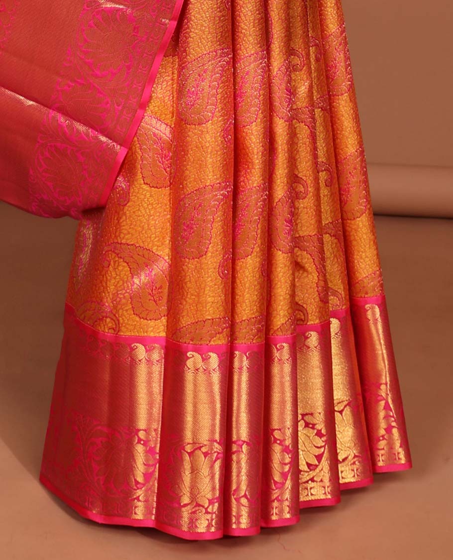 Orange paisley silk saree with contrast border of paisley,banaras,kodi visiry,paun designs & floral, checked zari design pallu