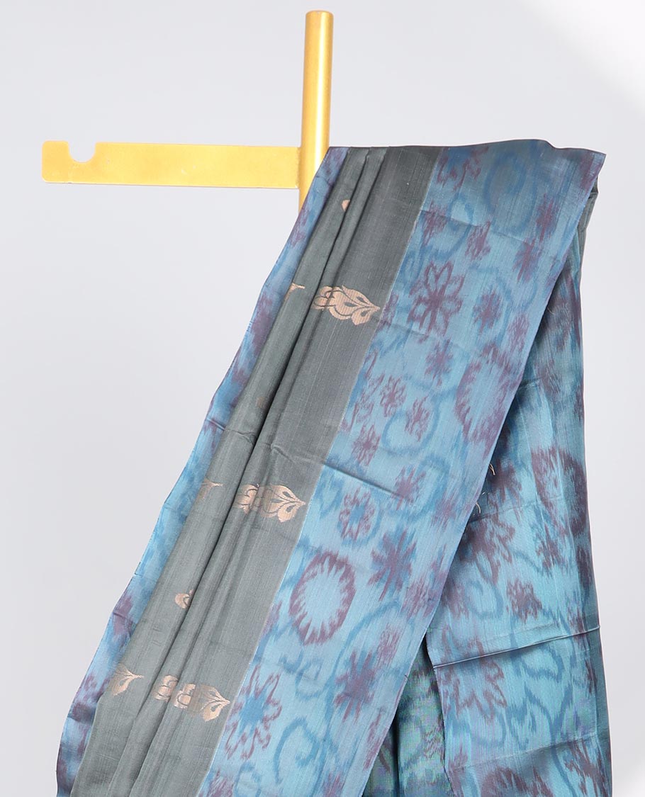 Black floral motifs semi-soft silk saree with contrast border & floral vine design pallu