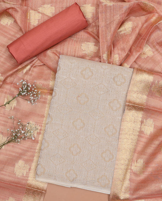 Cream chudidhar material set,intricate design top, orange plain bottom & floral design dupatta