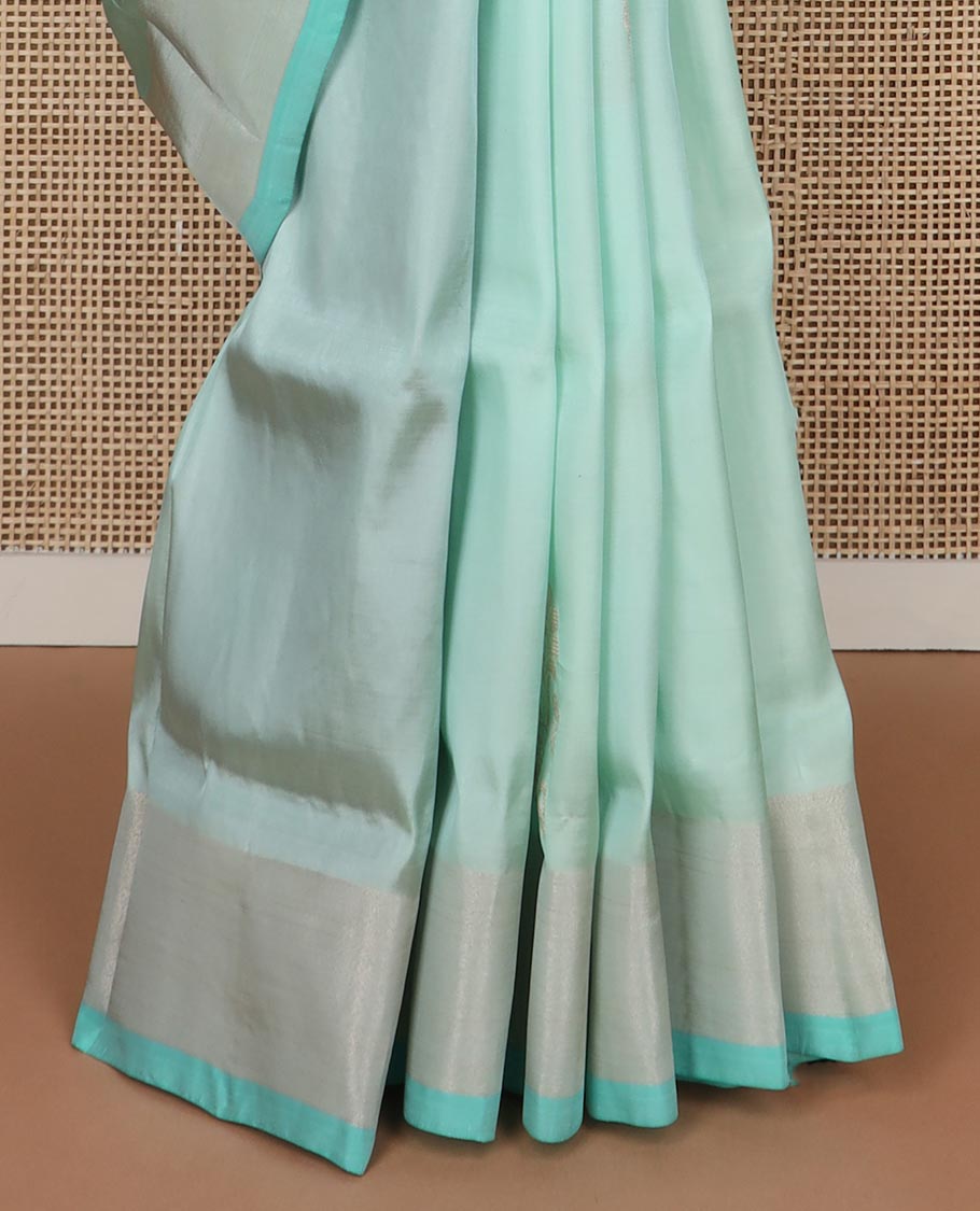 Light blue motifs uppada silk saree with self zari border & floral design pallu