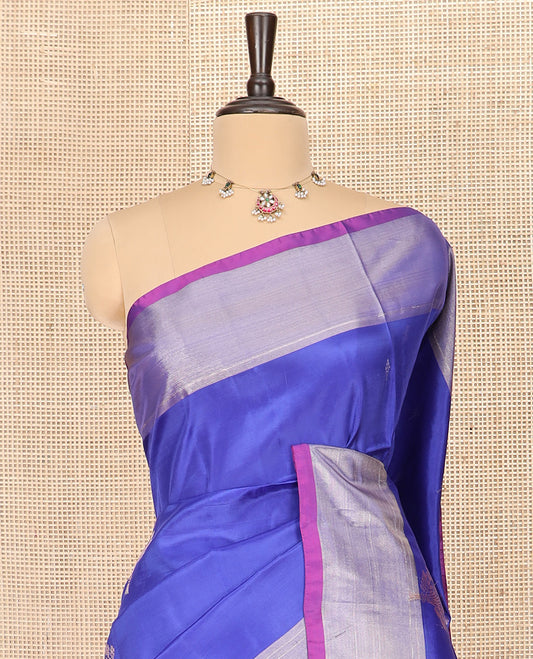 Blue Semi Uppada Saree Decked Up with Zari Buttas, Complemented by a Contrast Bavanji Border, Contrast Pallu Featuring Ogee Patterns, and Paired with a Contrast Blouse