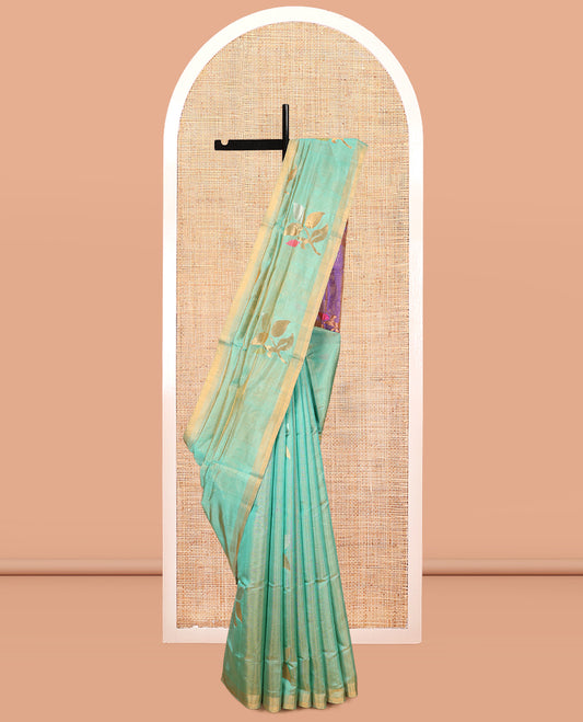 Green Uppada Silk Saree, Accentuated with Floral Vine Zari Buttas, a Zari Border, Complemented by Contrast Grand Pallu of Floral Buttas and a Contrast Blouse