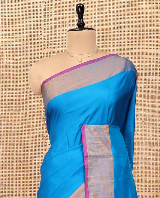 Blue Plain Uppada Silk Saree, Complemented by a Contrast Border, Contrast Zari Pallu, and a Contrast Blouse