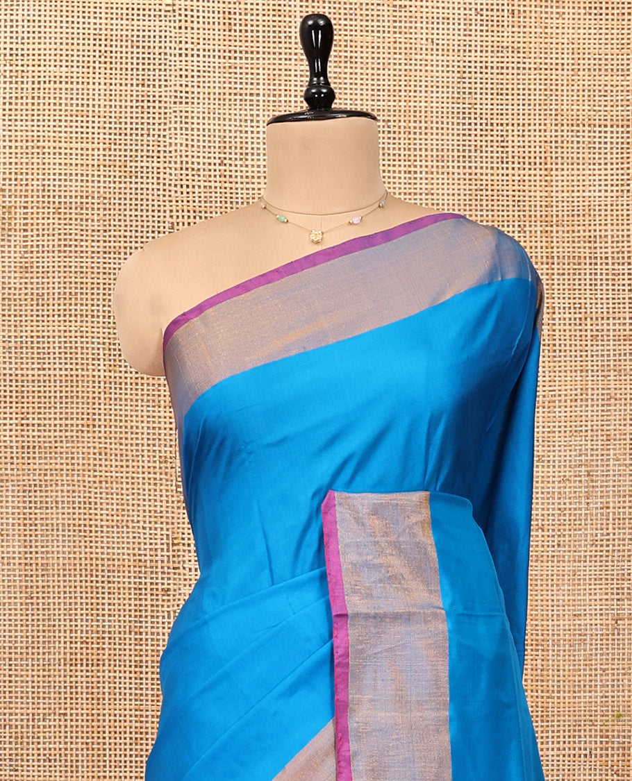 Blue Plain Uppada Silk Saree, Complemented by a Contrast Border, Contrast Zari Pallu, and a Contrast Blouse