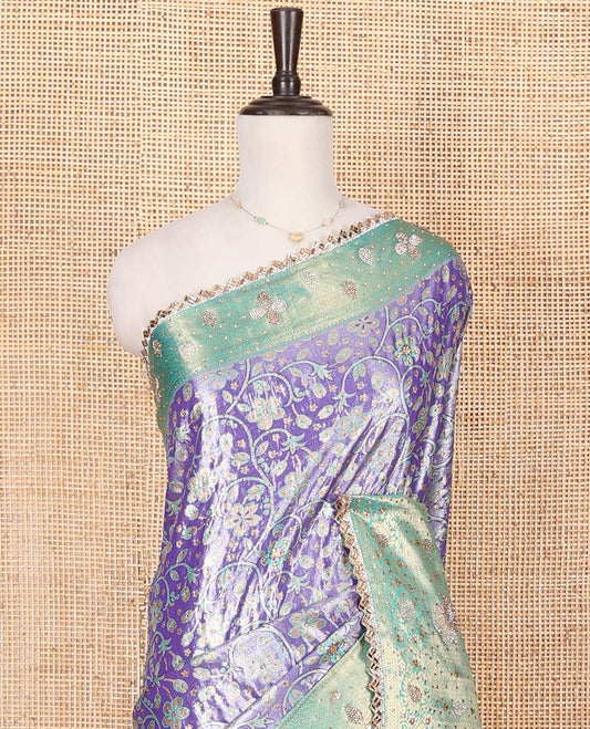 Lavender Vastrakala Silk Saree, Prettified with Floral Jaal and Stone Work, Complemented by Contrast Traditional Zari and Stone Embroidered Scallop Border, Gleaming Grand Stone Work Pallu, and Paired with Contrast Heavy Stone Embroidered Blouse
