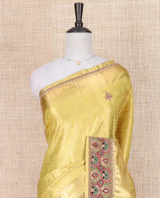 Yellow Vastrakala Silk Saree, Artfully Detailed with Floral Jacquard and Patch Work, Complemented by Mixed Intricately Embroidered Border, Grand Jaal Design Stone Work Pallu, and Paired with Heavy Embroidered Blouse