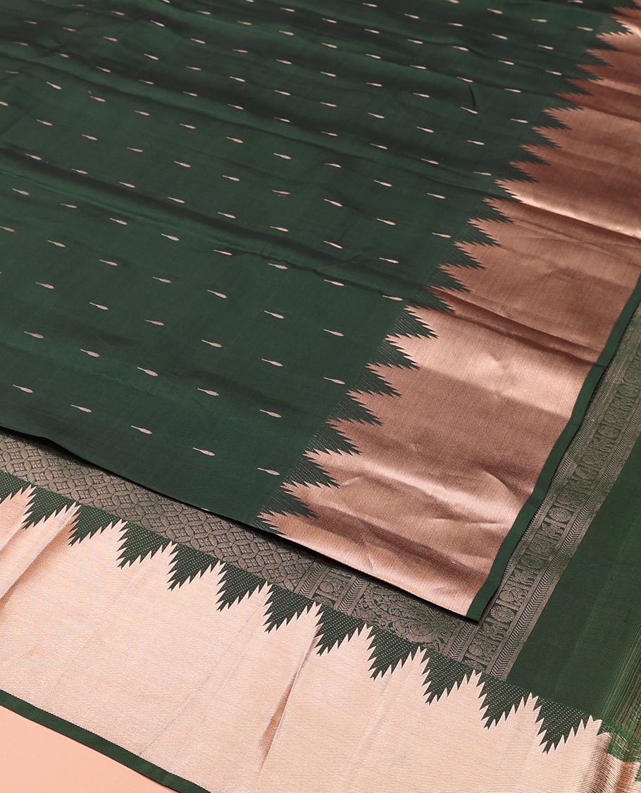 Green Vasundhara Lite-Silk Mix Saree, Spotlighted with Zari Buttas All Over Its Body, Highlighted by a Thazampoo Rekku Border, Meticulously Crafted Pallu, and Paired with a Matching Blouse