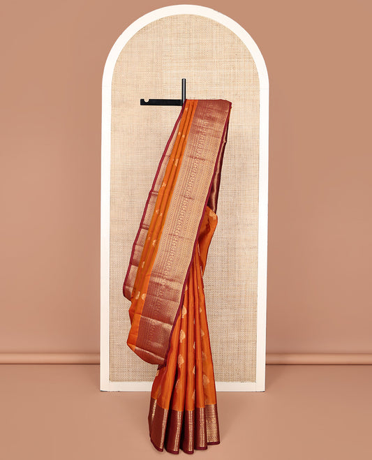 Orange Vasundhara Silk Mix Saree, Entralled with Zari Buttas All Over Its Body, Complemented by Contrast Border of Lavangam, Kathir, Laddu Kamalam, Neli, Manga, and Kodi Visiry Designs, Grand Pallu and Paired with a Contrast Blouse