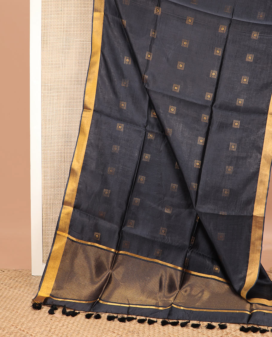 Black buttas banana pith saree, zari border, and zari striped pallu
