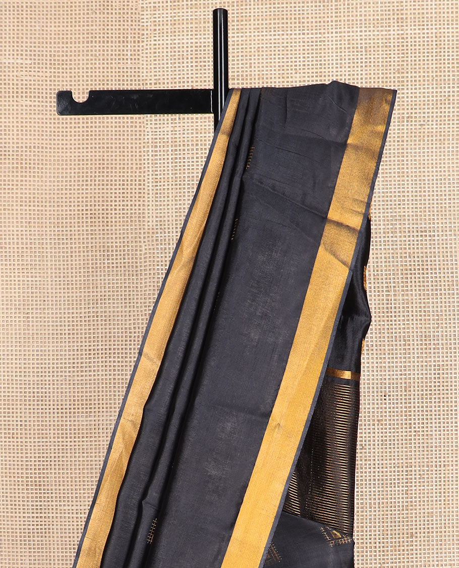 Black buttas banana pith saree, zari border, and zari striped pallu
