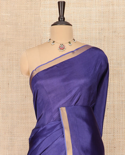 Blue Plain Banana Pith Saree Simply Sparkled with Zari Bavanji Border, Gleaming Zari Stripes Woven Pallu, and Paired with a Matching Plain Blouse