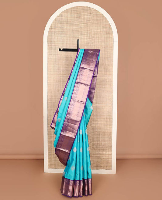 Light blue striped, buttas silk saree with contrast intricate zari design border & floral design pallu