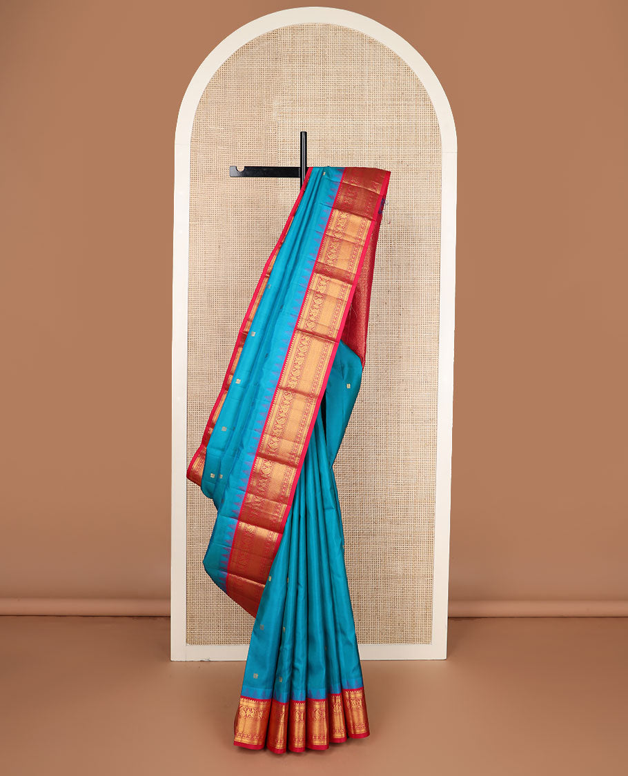 Blue mayil buttas silk saree, contrast border of thazampoo rekku,banaras,manga,mayil,diamond & mayil kann & intricate pallu
