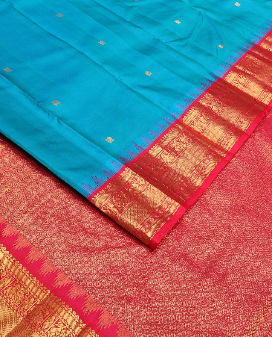 Blue mayil buttas silk saree, contrast border of thazampoo rekku,banaras,manga,mayil,diamond & mayil kann & intricate pallu