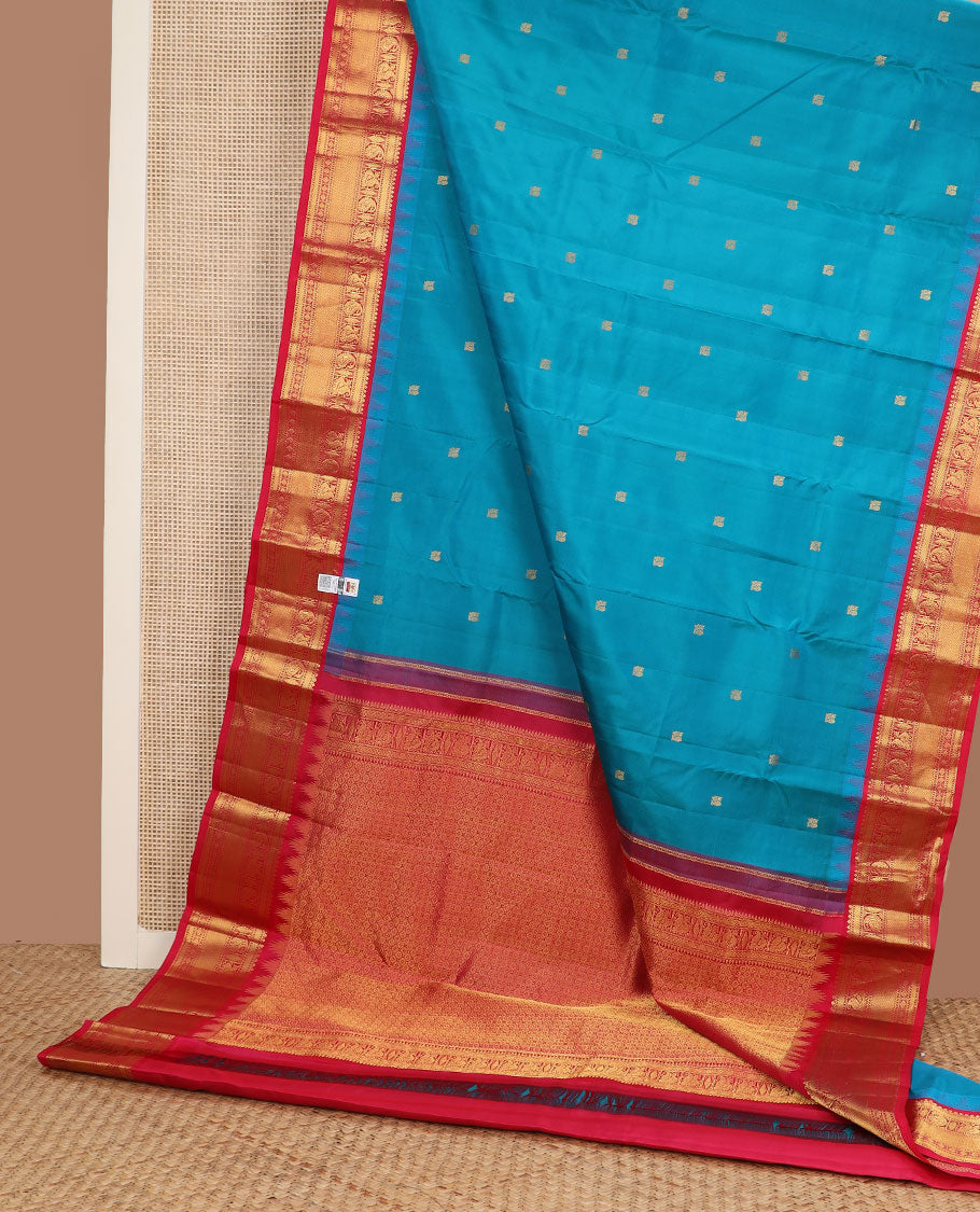 Blue mayil buttas silk saree, contrast border of thazampoo rekku,banaras,manga,mayil,diamond & mayil kann & intricate pallu