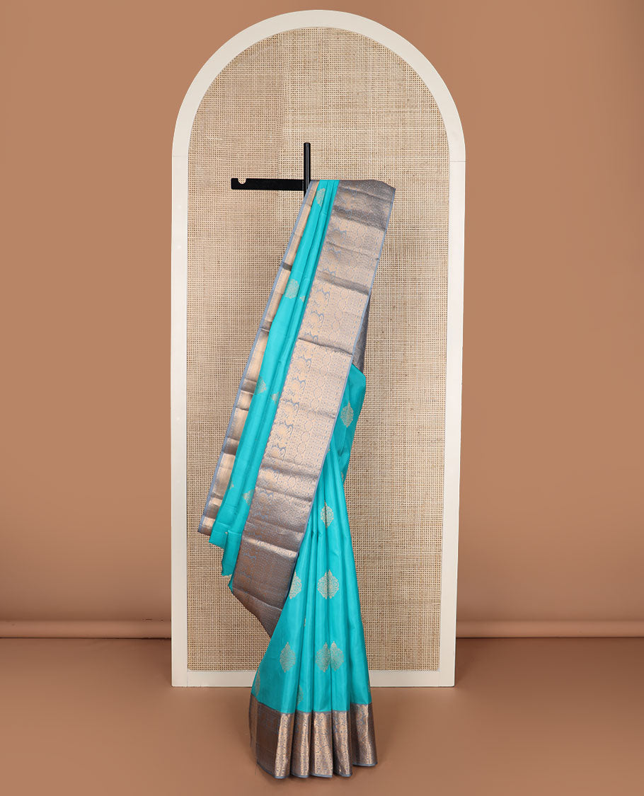 Blue zari buttas silk saree, contrast border of rekku,mayil, cross key & laddu kamlam & intricate pallu