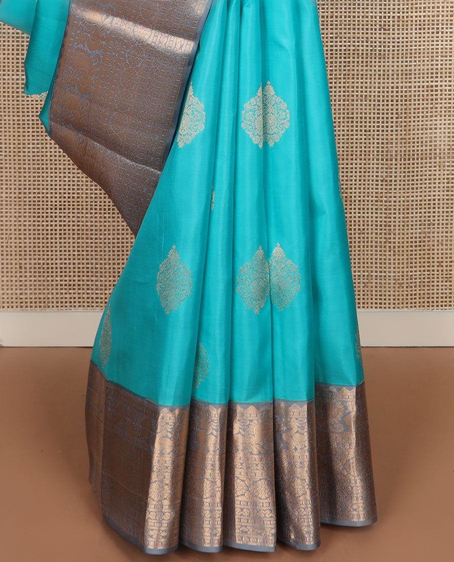 Blue zari buttas silk saree, contrast border of rekku,mayil, cross key & laddu kamlam & intricate pallu