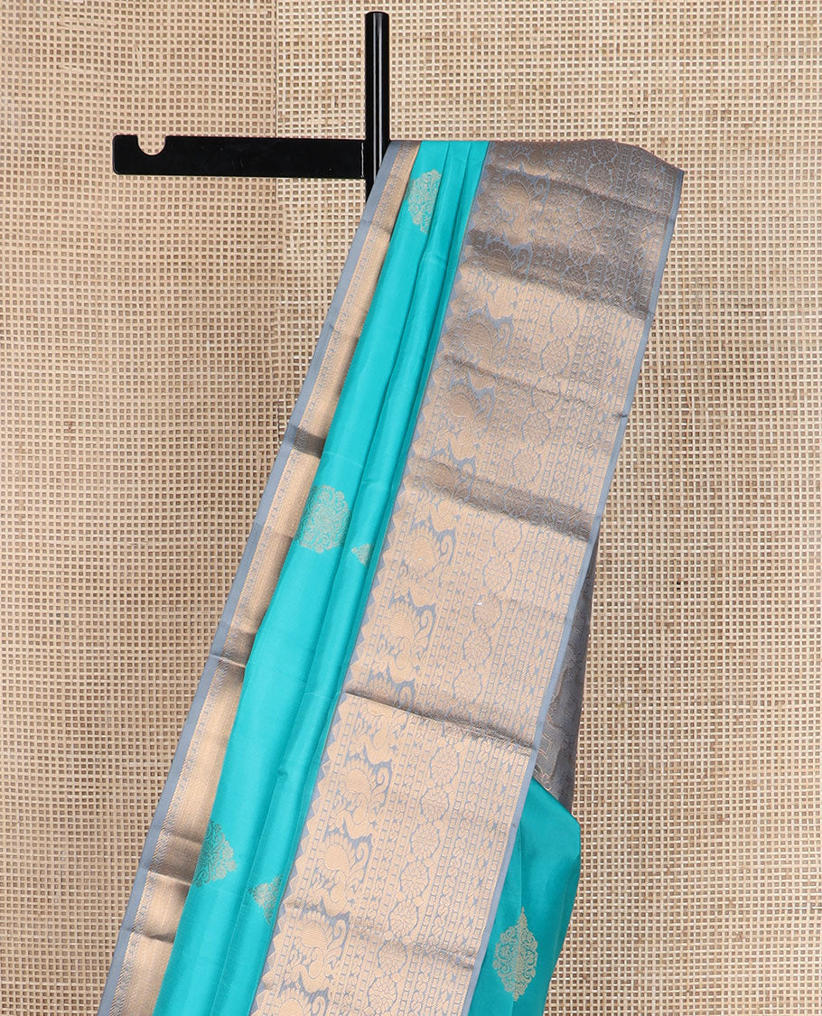 Blue zari buttas silk saree, contrast border of rekku,mayil, cross key & laddu kamlam & intricate pallu