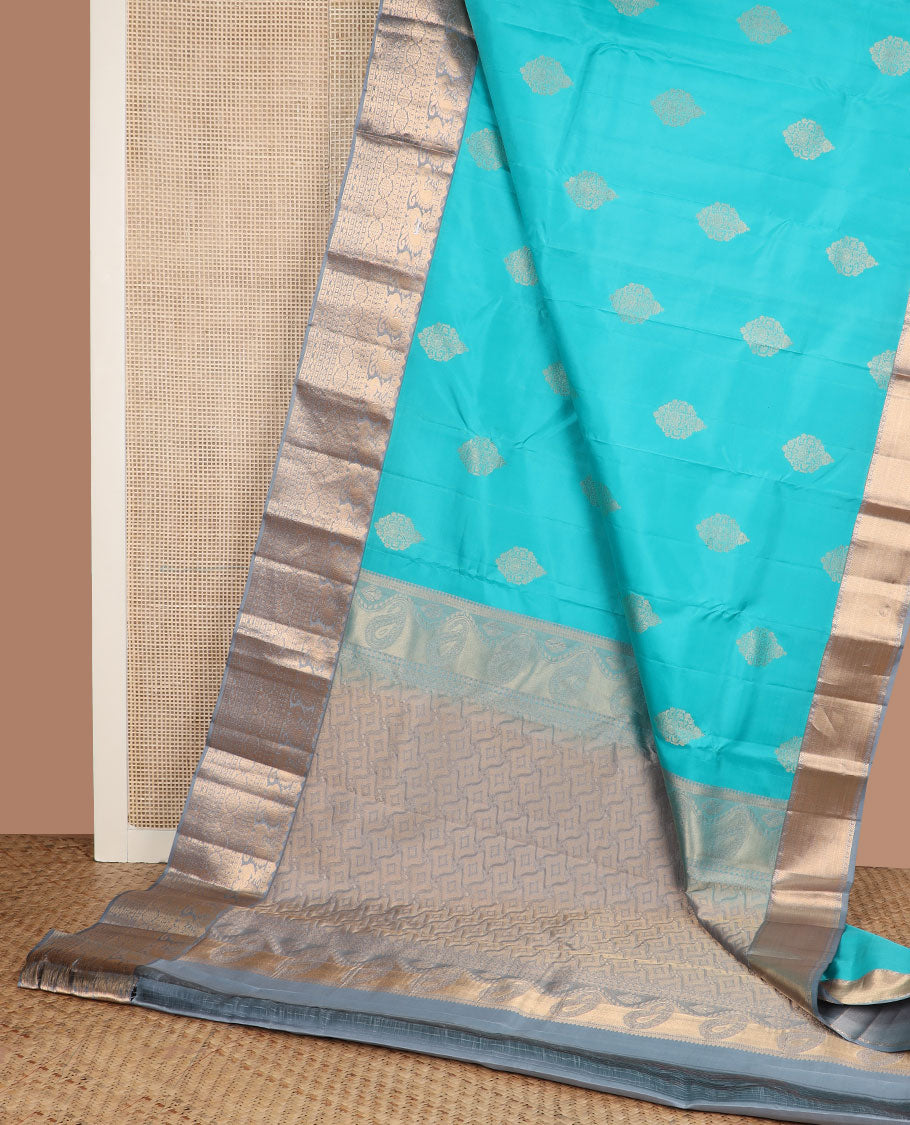 Blue zari buttas silk saree, contrast border of rekku,mayil, cross key & laddu kamlam & intricate pallu