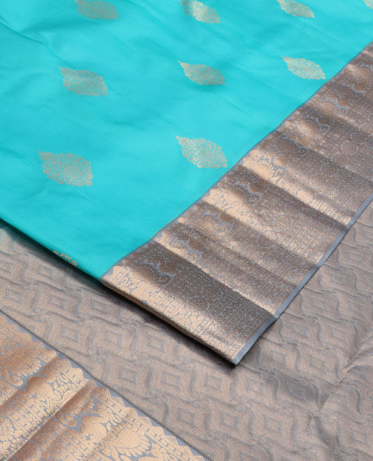 Blue zari buttas silk saree, contrast border of rekku,mayil, cross key & laddu kamlam & intricate pallu