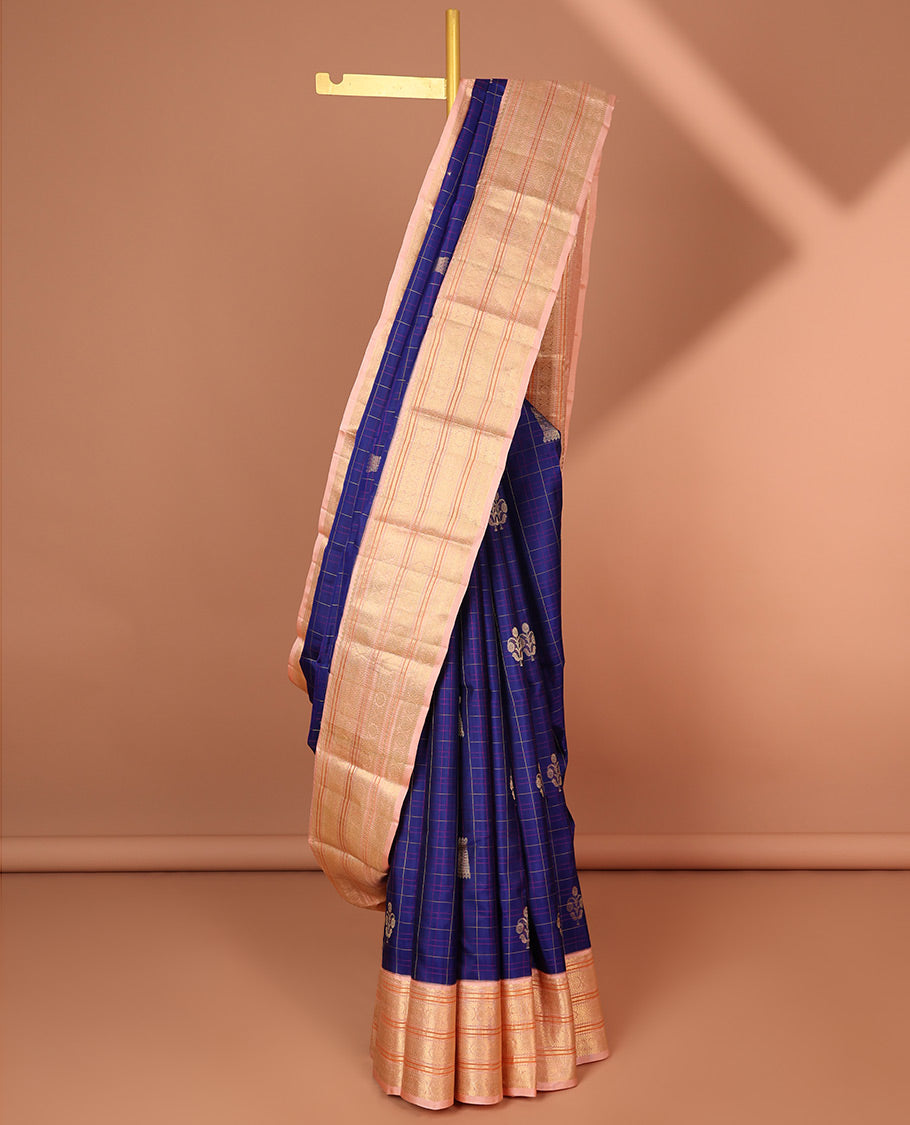 Blue checked with buttas silk saree , intricate zari design pallu & korvai border of rekku, poo chakram design