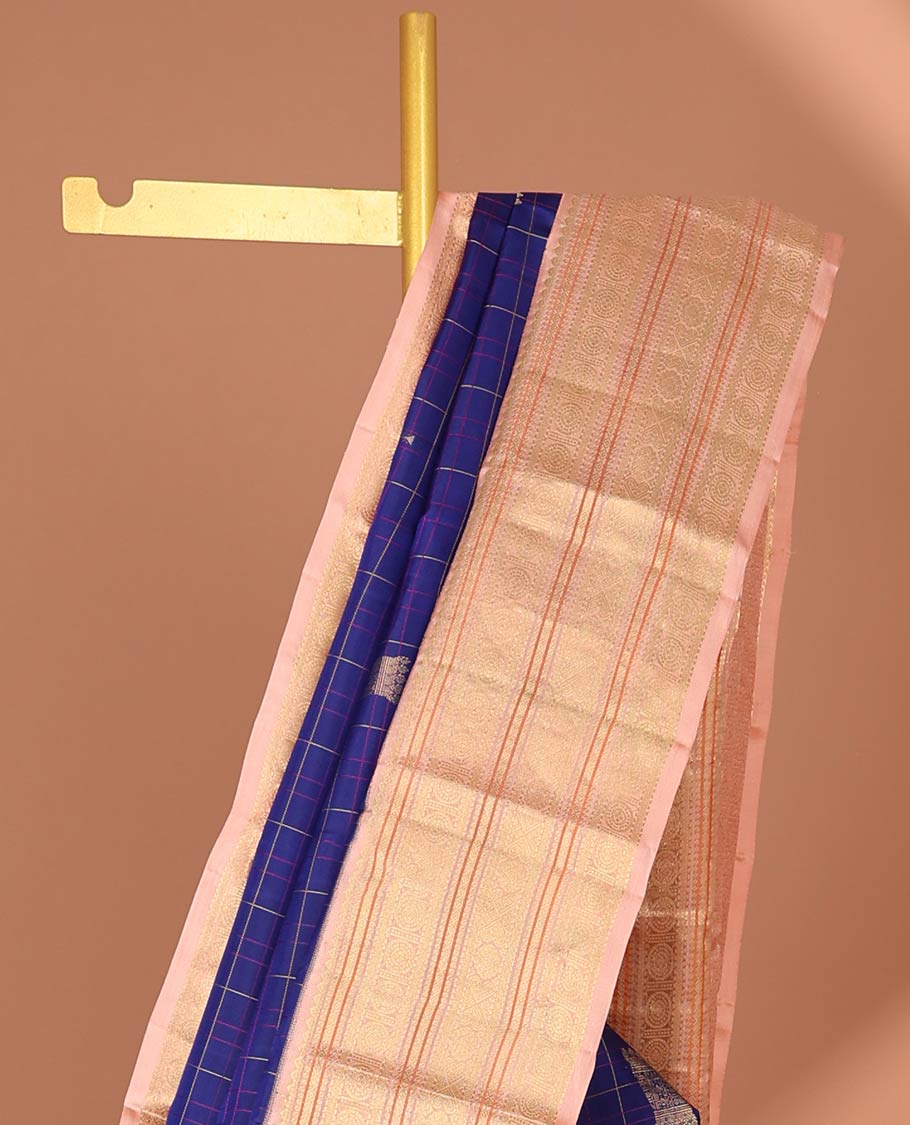Blue checked with buttas silk saree , intricate zari design pallu & korvai border of rekku, poo chakram design