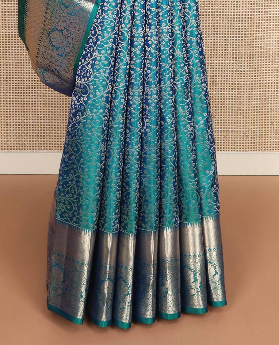Blue jacquard Kanchipuram wedding silk saree, zari border of rekku, kuyil kann, thilakam mokku, Muthu, and floral design, and floral design pallu