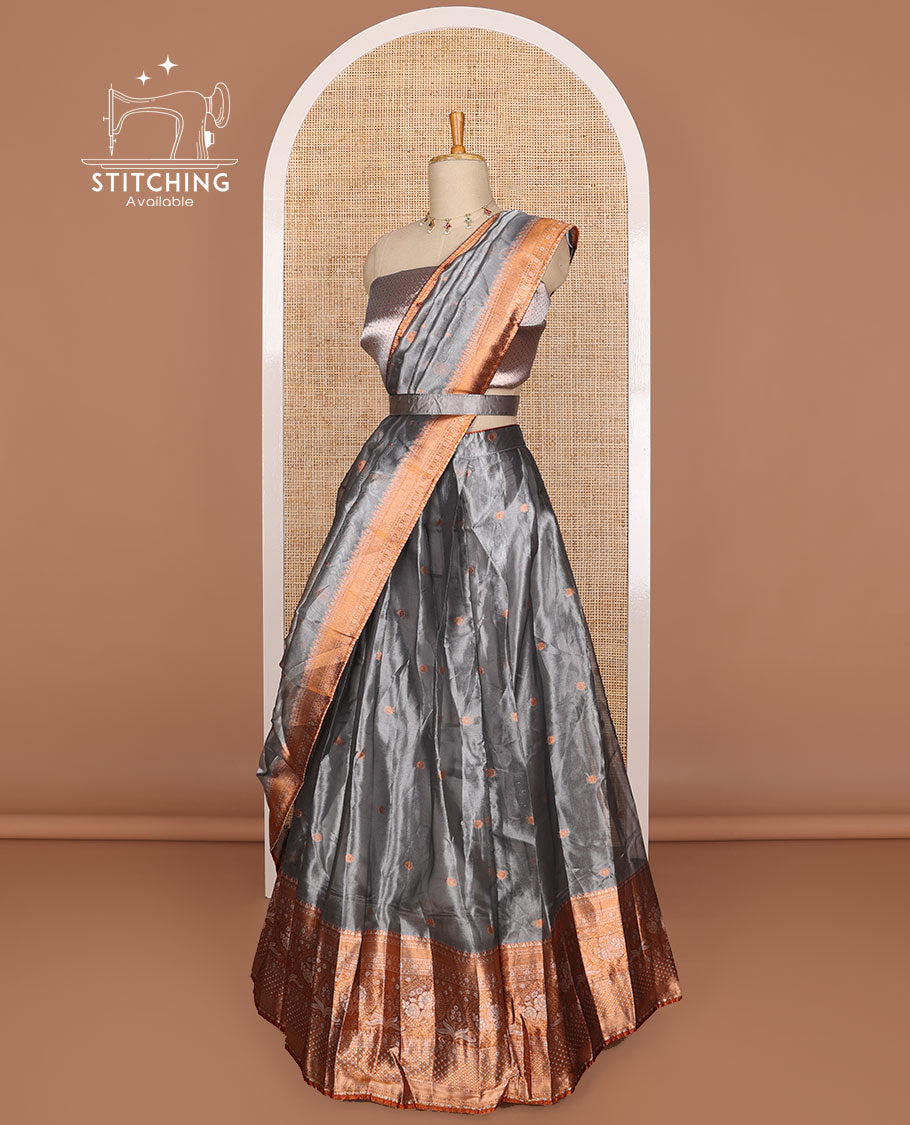 Blue grey buttas tissue half saree with contrast zari design border, floral design blouse & floral design dhavani