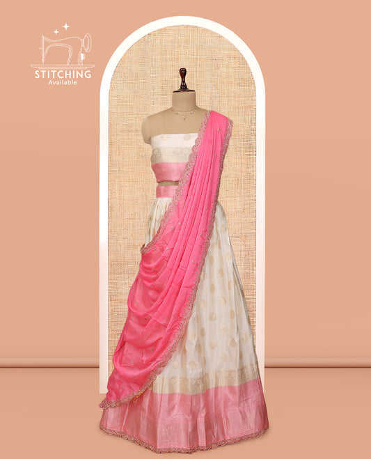 Cream-Pink Banarasi Half-Saree, Bedecked with Buttas Skirt, a Contrast Traditional Lace Border, Matching Blouse, and Scallop Embroidered Dupatta