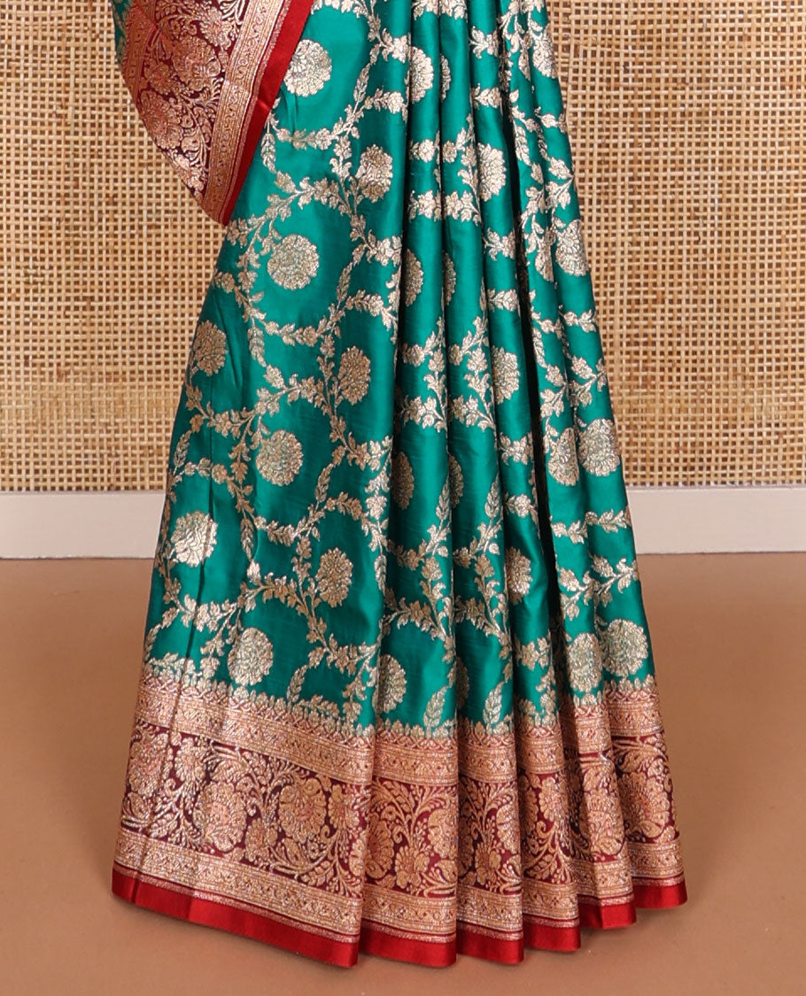 Green floral jaal design semi banaras nylon saree with self floral zari design border & floral design pallu