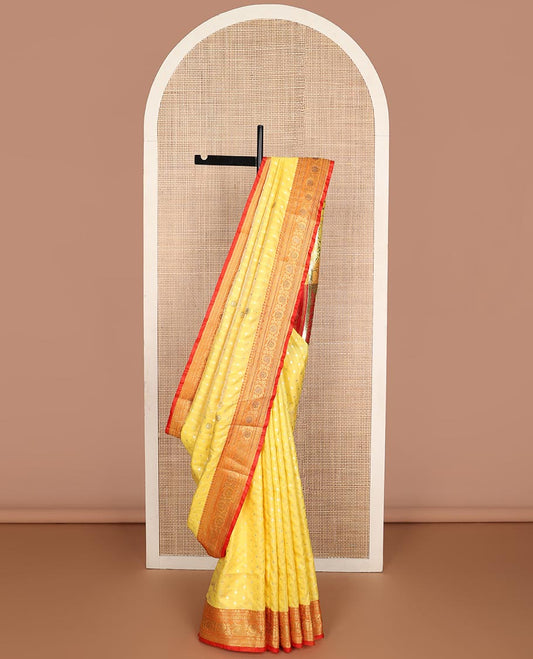 Yellow buttas semi banaras nylon with contrast floral design border & floral design pallu