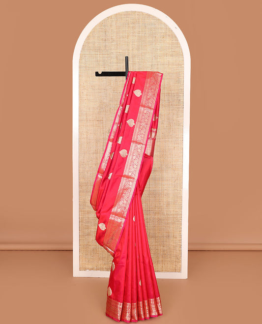 Pink zari buttas kathan silk saree, traditional border of paisley creeper designs, and jaal pallu