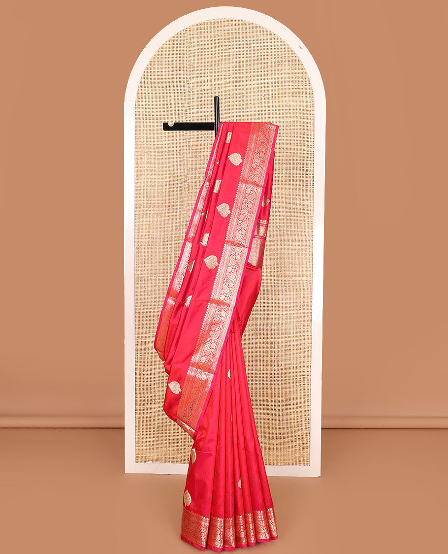Pink zari buttas kathan silk saree, traditional border of paisley creeper designs, and jaal pallu