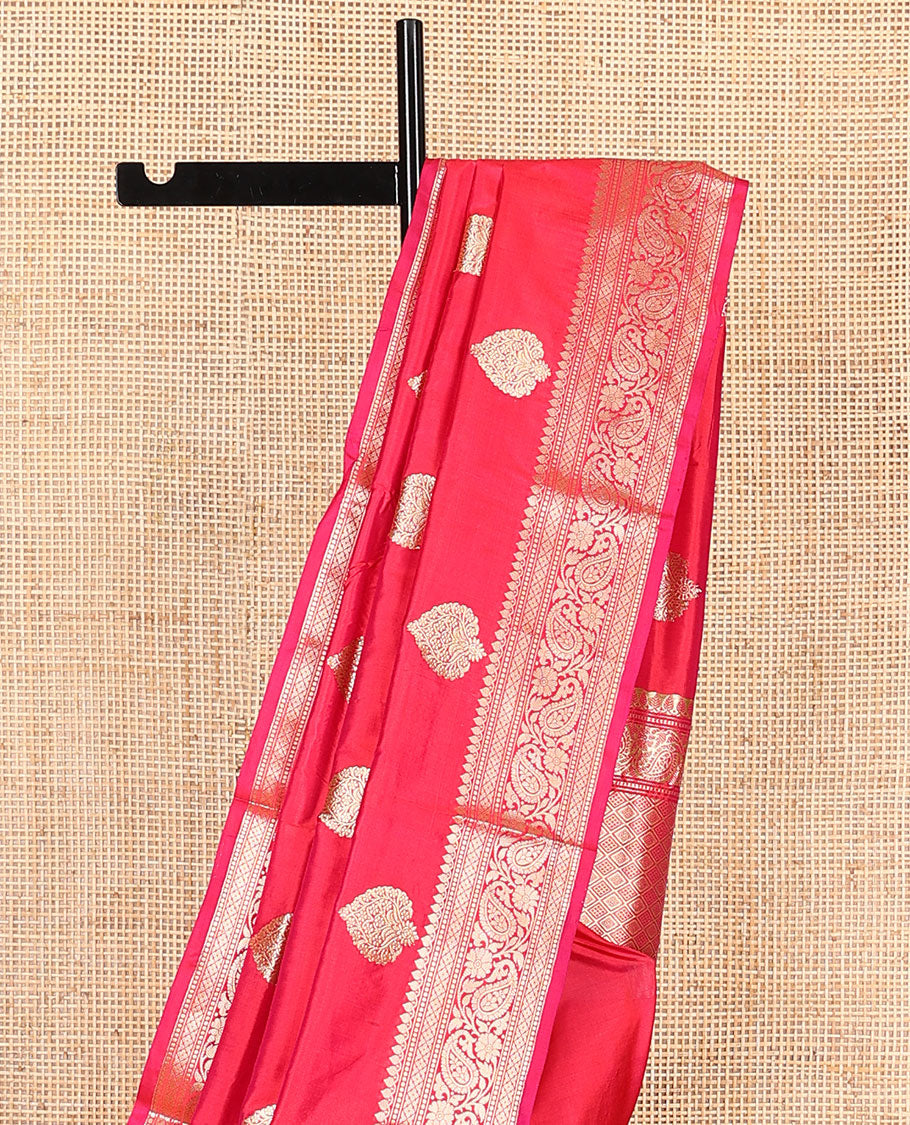 Pink zari buttas kathan silk saree, traditional border of paisley creeper designs, and jaal pallu