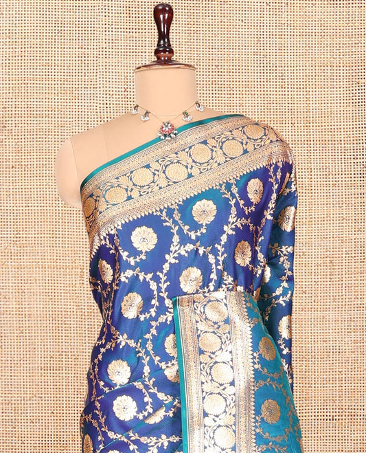 Blue Banarasi Nylon Saree, Ornamented with Floral Jacquard, Contrast Floral Creeper Zari Border, Intricate Pallu, and a Contrast Blouse