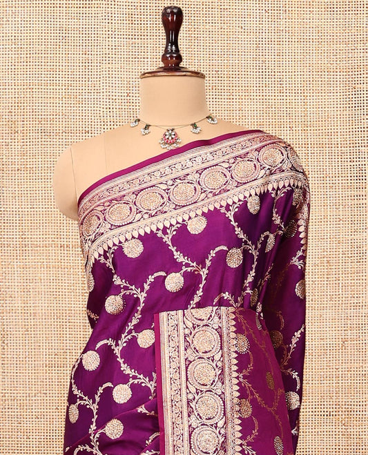 Purple Banarasi Satin Saree, Decorated with Floral Jaal Jacquard, a Floral Creeper Border, Intricate Stonework Pallu, and a Matching Blouse