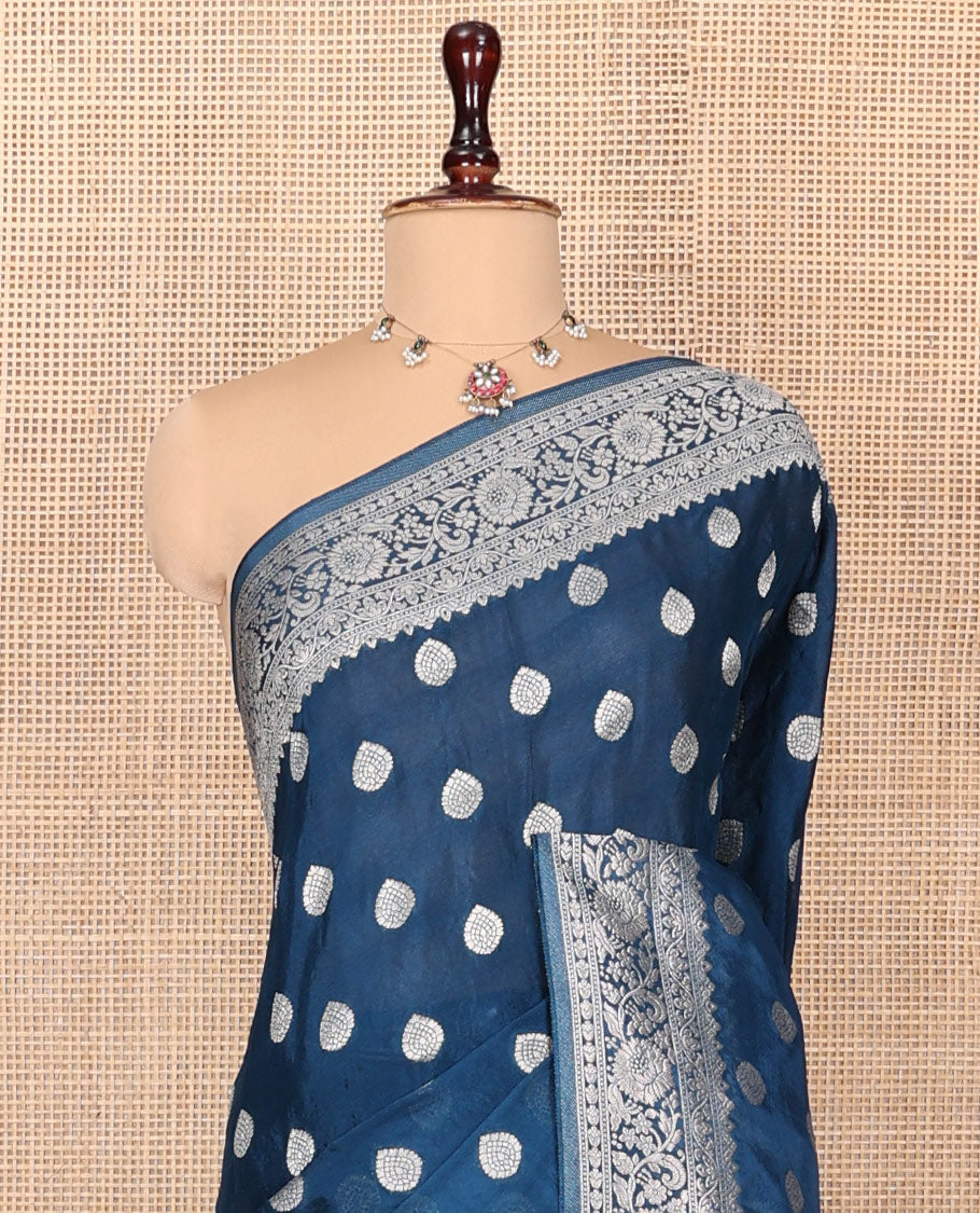 Blue Fancy Crepe Saree, Gleamed Up with Thilakam Buttas, Highlighted by a Traditional Border, Intricately Designed Pallu, and a Matching Blouse