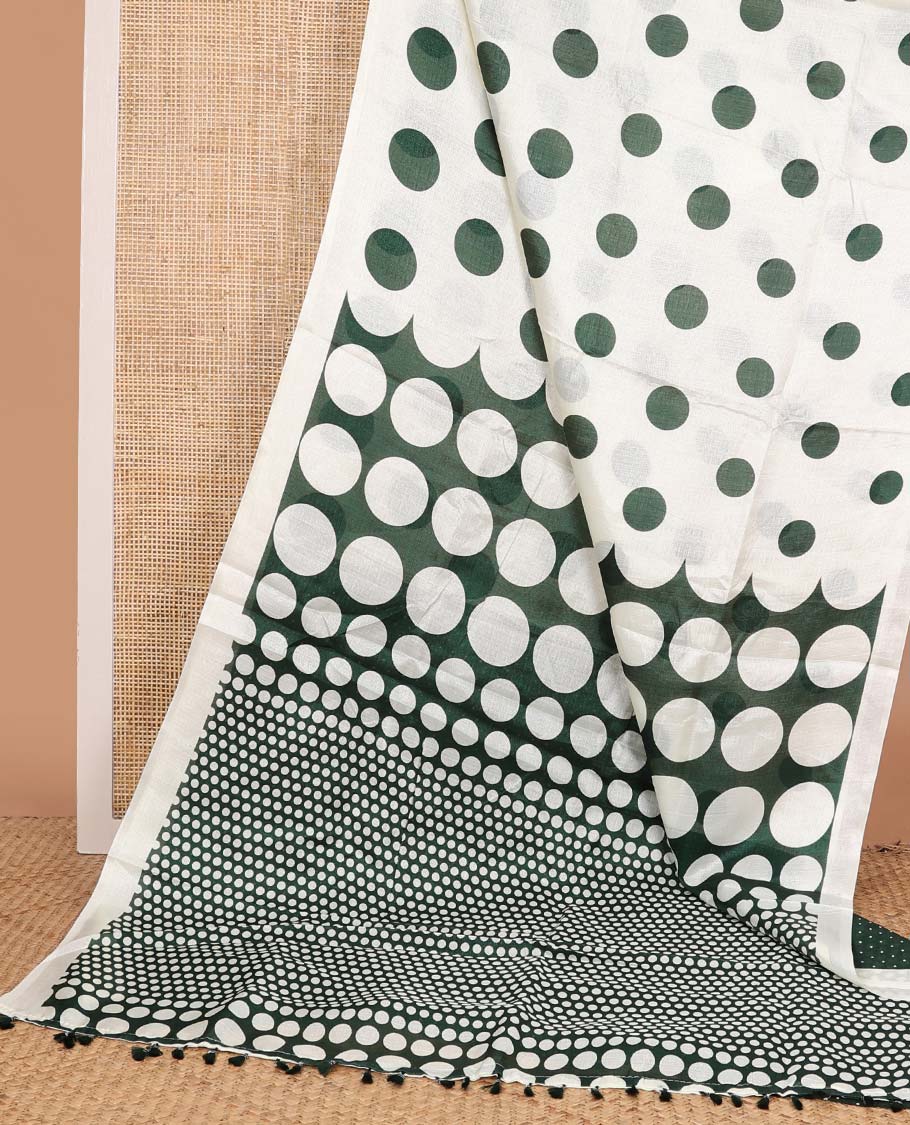 White base saree steeped with big green polka dots, plain border, and pallu of polka dots