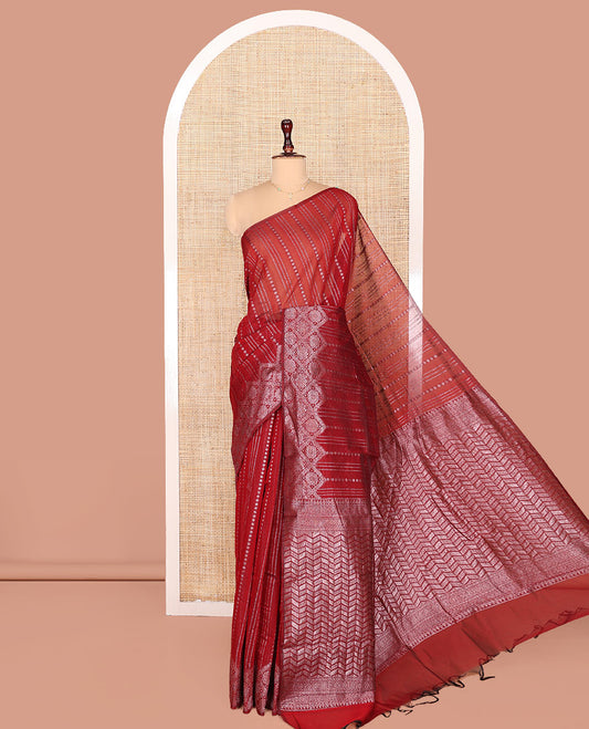 Borderless Red Semi-Silk Cotton Saree, Gracefully Embellished with Traditional Zari Designs on Its Body, Highlighted by Pallu of Chevron Designs, and Paired with a Matching Blouse