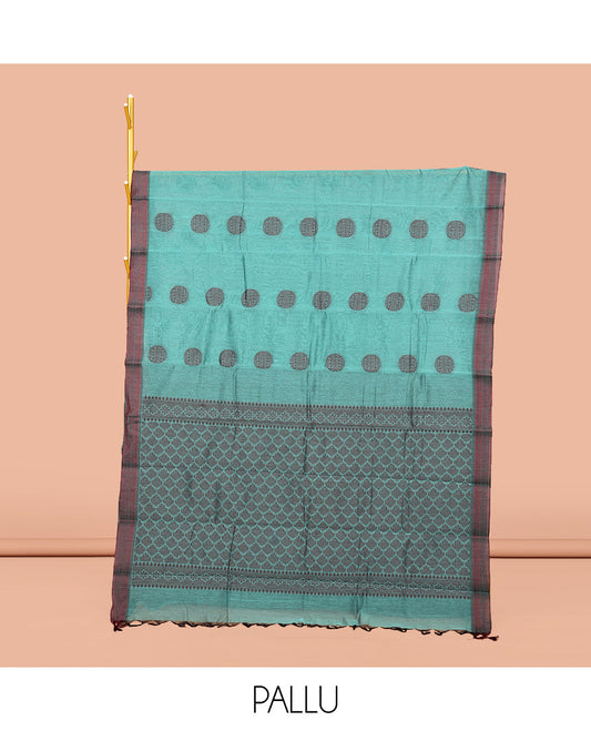 Blue Semi-Silk Cotton Saree, Finely Crafted with Round Buttas on Its Body, Complemented by a Contrast Thread Traditional Motifs Woven Border, Jaal Design Pallu, and Paired with a Contrast Blouse